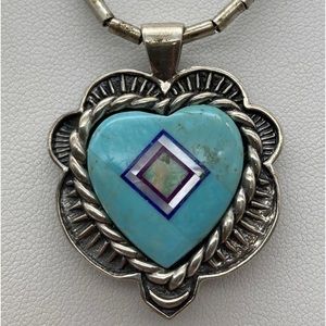 Vibrant estate reversible heart shaped pendant with necklace.